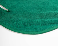 Close up detail of Grove + Green's signature 100% terry cloth golf cart seat towel with green trim.