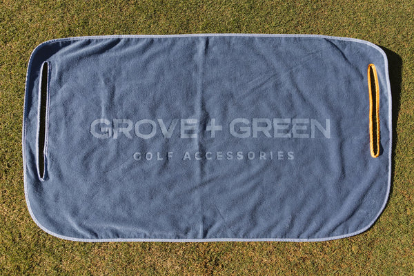 Grove + Green navy blue 100% terry cloth golf cart seat towel with classic blue trim.