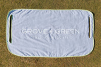 Grove + Green light blue periwinkle 100% terry cloth golf cart seat towel with green trim.