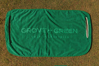 Grove + Green golf green 100% terry cloth golf cart seat towel with green trim.