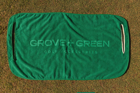 Grove + Green golf green 100% terry cloth golf cart seat towel with green trim.